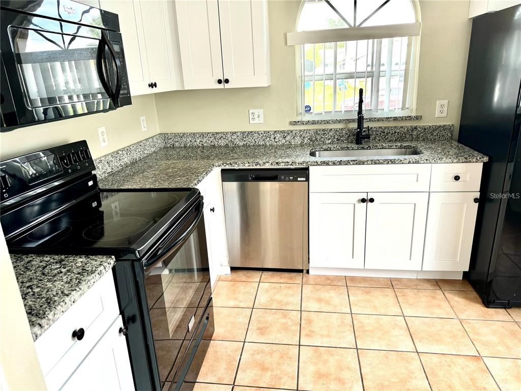 7808 LAUREL OAK LANE, KISSIMMEE, FL — photo 2 of 24