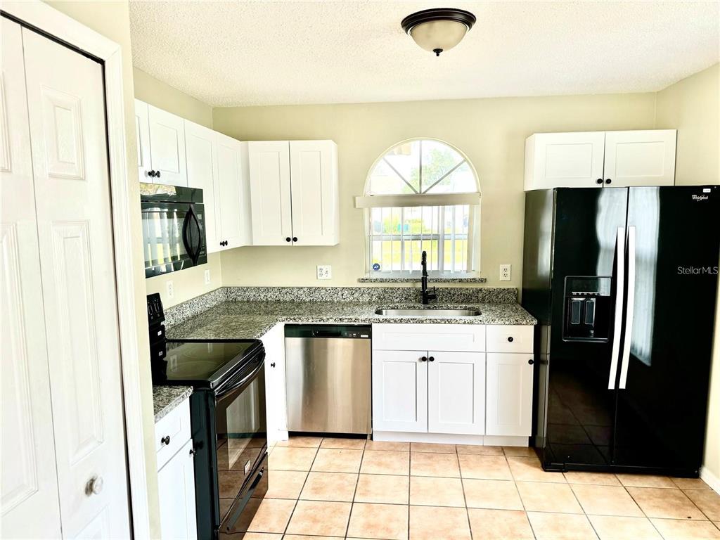7808 LAUREL OAK LANE, KISSIMMEE, FL — photo 3 of 24