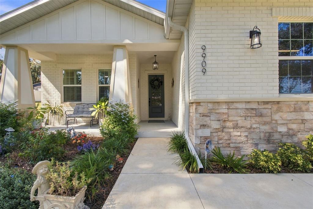 9909 PINE LEAF LANE, DADE CITY, FL — photo 2 of 52