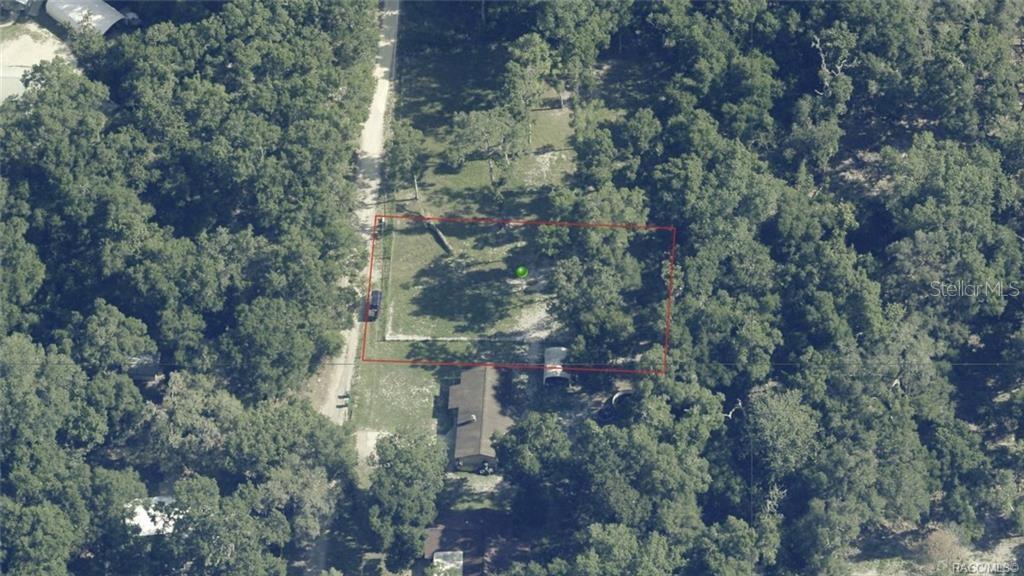 An aerial view shows a rectangular property boundary outlined in red over a wooded lot — 4689 & 4713 S IRONWOOD POINT, INVERNESS, FL
