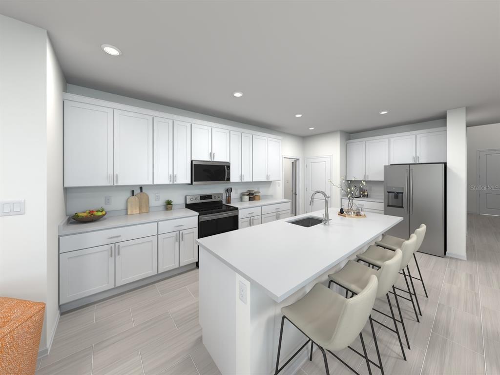 This is a digital rendering of a modern kitchen featuring white cabinetry and a central island — 1777 ARCHER DRIVE, MINNEOLA, FL