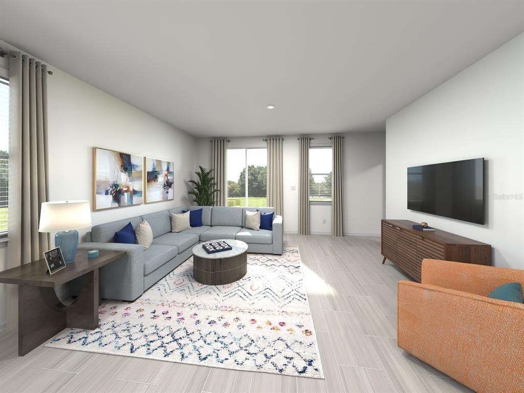This is a digital rendering of a living room with a sectional, rug, and television — 1777 ARCHER DRIVE, MINNEOLA, FL
