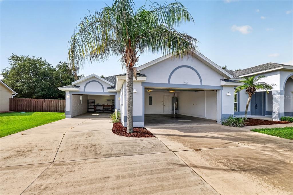 36731 TROPICAL WIND LANE, GRAND ISLAND, FL — photo 2 of 30
