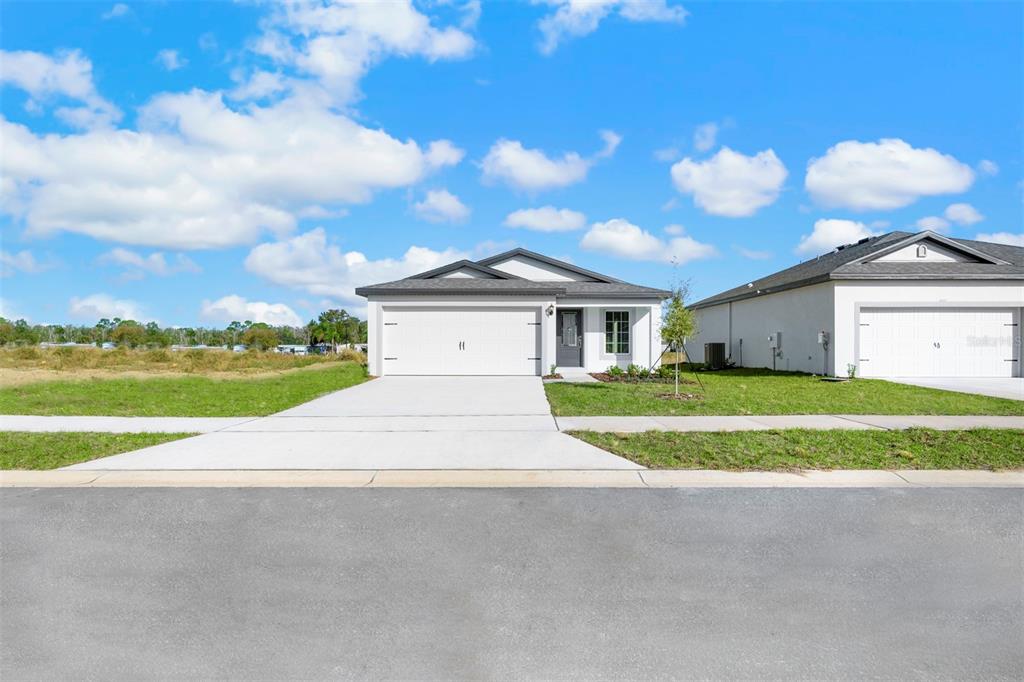 13379 TULA LOOP, ASTATULA, FL — photo 2 of 20