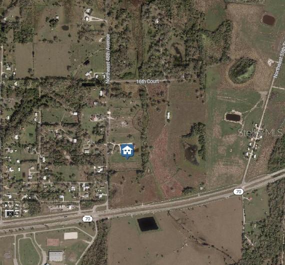 This is an aerial map showing a property location near State Road 70 — 1132 NE 48TH AVENUE, OKEECHOBEE, FL