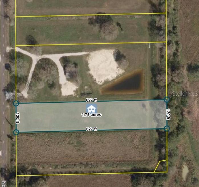 This is an aerial map showing a rectangular 1.73-acre plot of land — 1132 NE 48TH AVENUE, OKEECHOBEE, FL