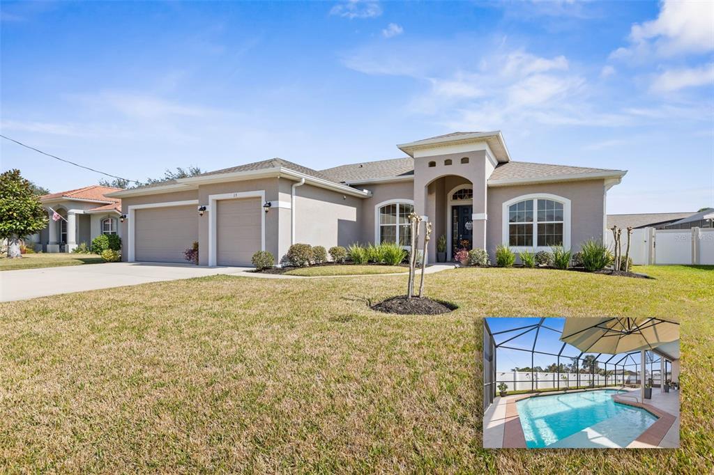 A single-story beige house with a two-car garage and an inset photo of a pool — 15 FAIRCHILD LANE, PALM COAST, FL