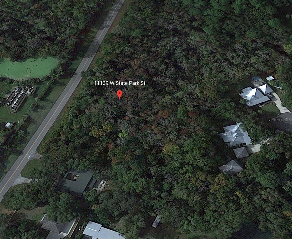 This is an aerial map view of a wooded lot located next to a road — 11139 W STATE PARK ST, CRYSTAL RIVER, FL