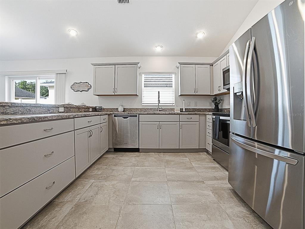 7380 SE 168TH DIPIETRO LANE, THE VILLAGES, FL — photo 4 of 30
