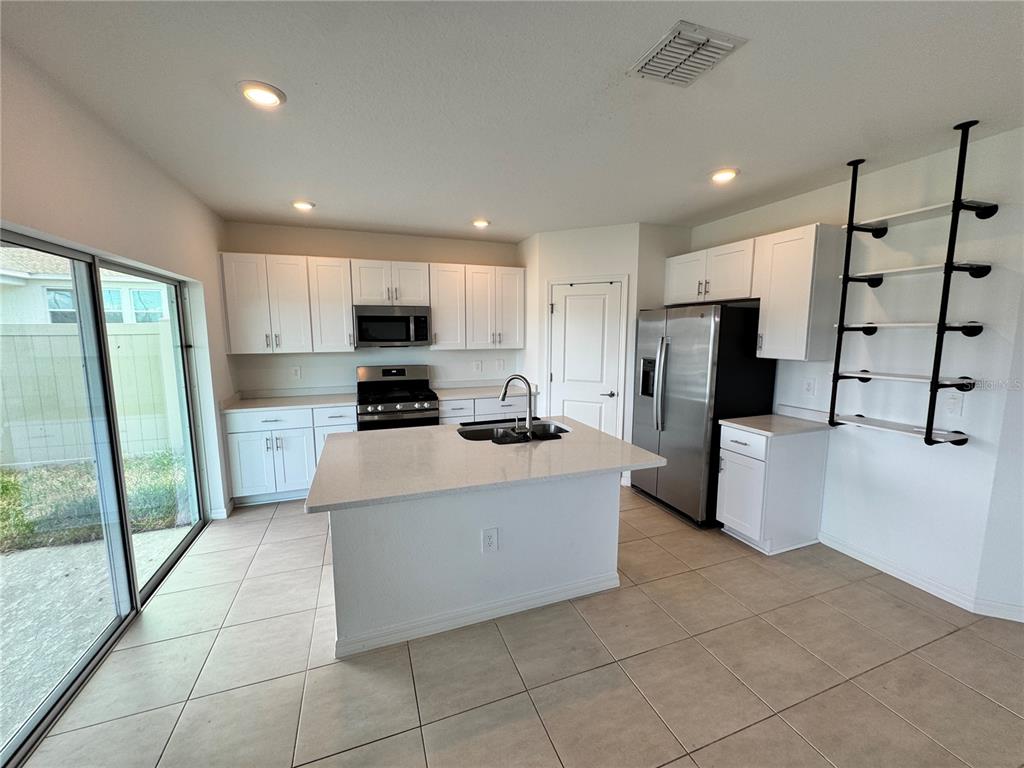 33981 SKY BLOSSOM CIRCLE, LEESBURG, FL — photo 5 of 16