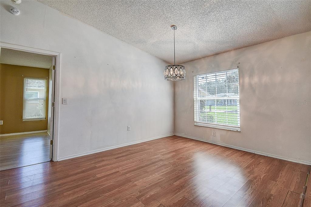 8265 GOODRICH STREET, SPRING HILL, FL — photo 5 of 34