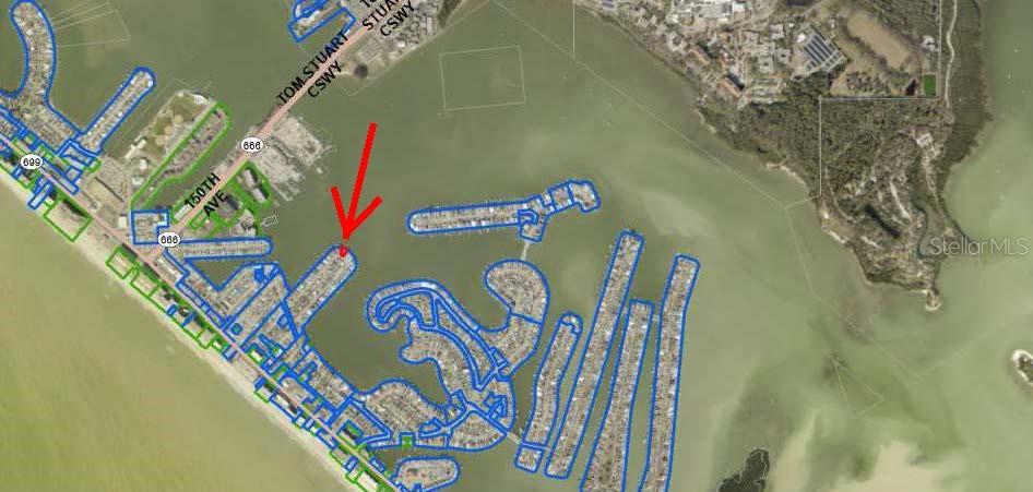 An aerial map shows a red arrow pointing to a specific waterfront property location — 376 145TH AVENUE E, MADEIRA BEACH, FL