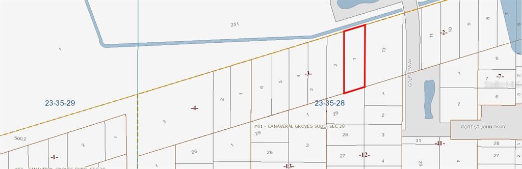 This image is a property tax map showing a highlighted parcel of land — NONE, COCOA, FL