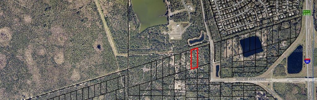 This is an aerial map showing a rectangular property lot outlined in red — NONE, COCOA, FL