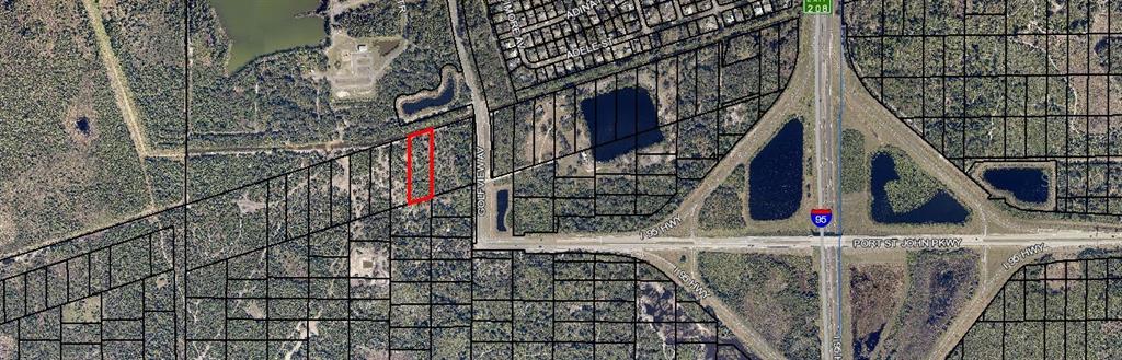 This is an aerial map showing a highlighted rectangular parcel of land near a highway — NONE, COCOA, FL