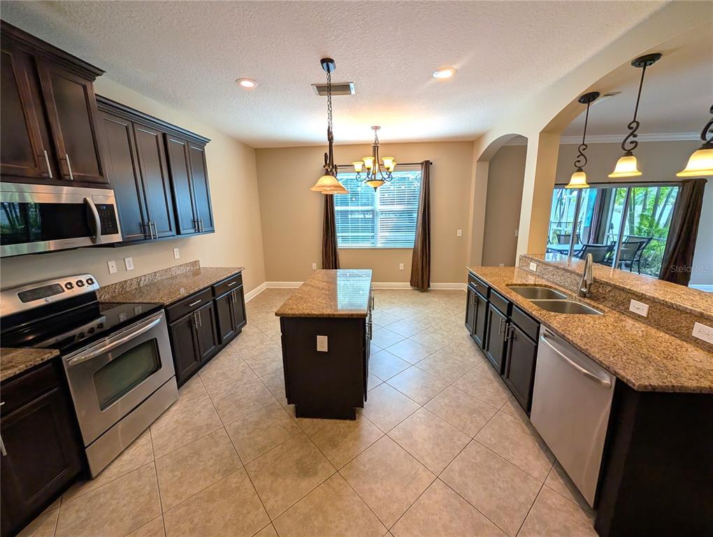 7714 LANDCARE LANE, TAMPA, FL — photo 5 of 27