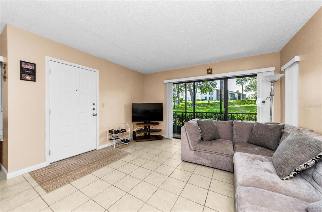 2575 PINE RIDGE WAY S UNIT E1, PALM HARBOR, FL — photo 2 of 19