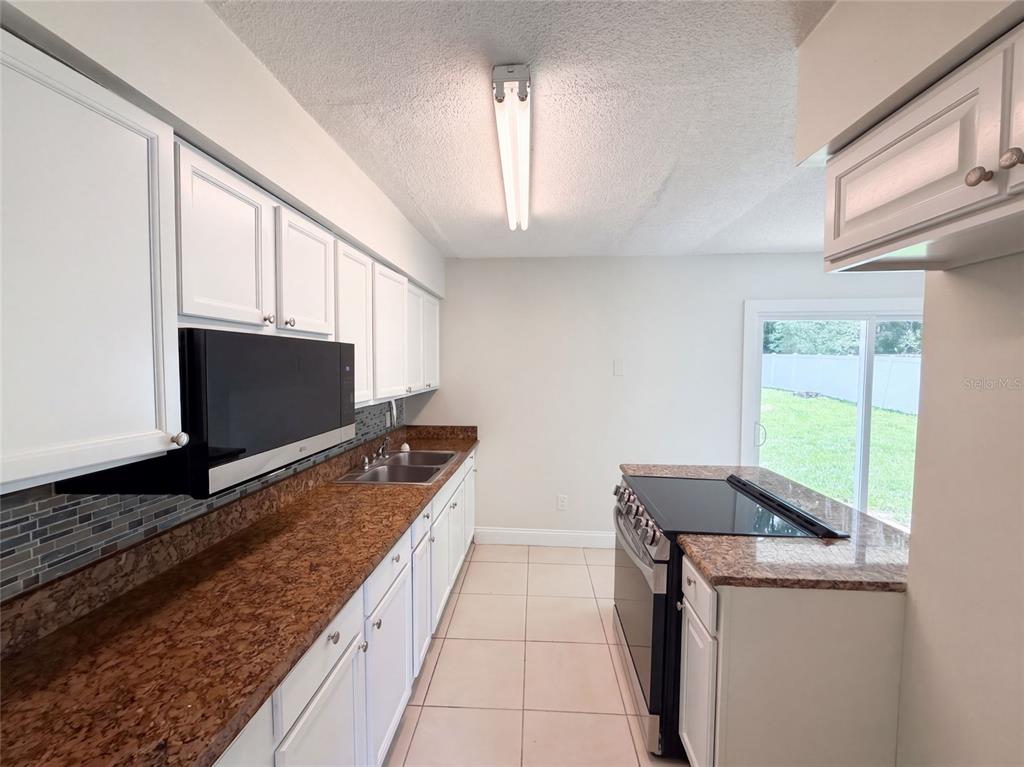 1336 NADINE DRIVE, DELTONA, FL — photo 2 of 19