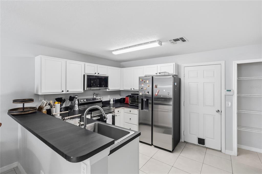 13015 LEXINGTON SUMMIT STREET, ORLANDO, FL — photo 5 of 24