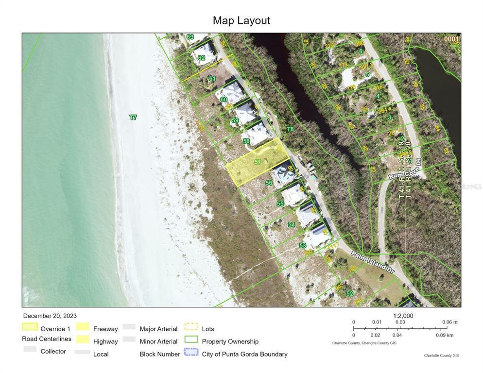 This map shows a coastal property lot highlighted in yellow along Palm Island Drive — 6920 PALM ISLAND DRIVE, PLACIDA, FL