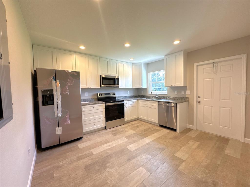 8256 E HARVEST MOON, FLORAL CITY, FL — photo 5 of 18
