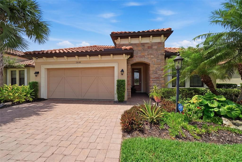 This is a floor plan of a single-story home featuring two bedrooms, an office, and kitchen — 13038 PRIMA DRIVE, BRADENTON, FL