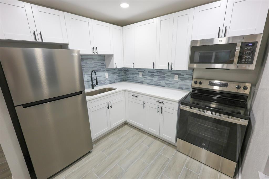 14906 N BAYSHORE DRIVE Unit #1, MADEIRA BEACH, FL — photo 4 of 13