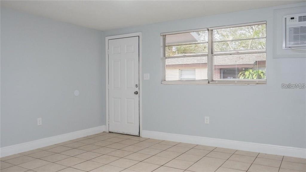 9416 GREYSTONE ROAD UNIT A, THONOTOSASSA, FL — photo 3 of 5