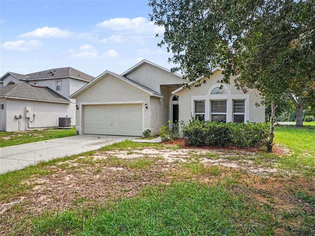 881 VANDERBILT DR, EUSTIS, FL — photo 2 of 28