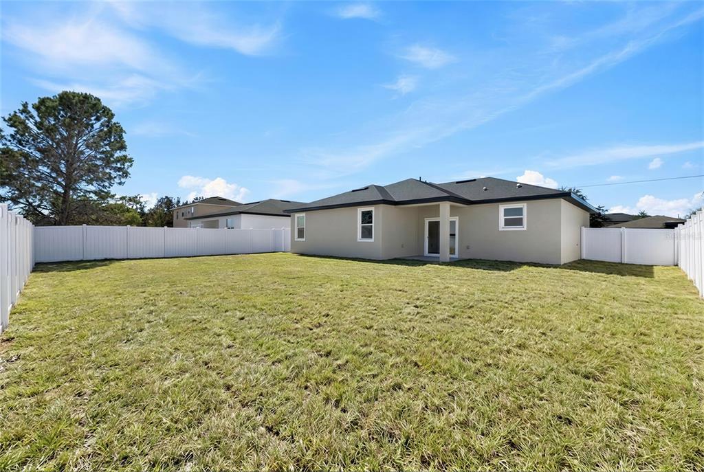 10 SWEET PEA CIRCLE, POINCIANA, FL — photo 4 of 32