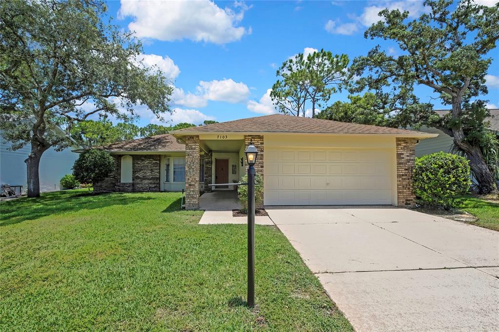 7103 CROWN OAKS DRIVE