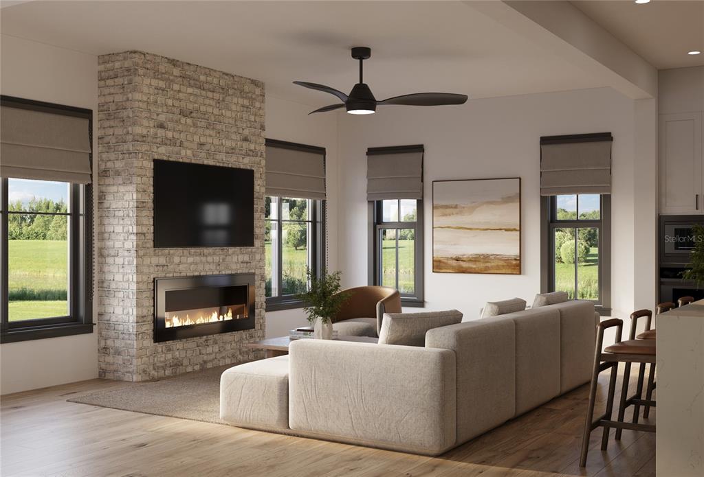 This is a rendering of a living room featuring a brick fireplace and sectional sofa — 1012 COURTLAND STREET, ORLANDO, FL