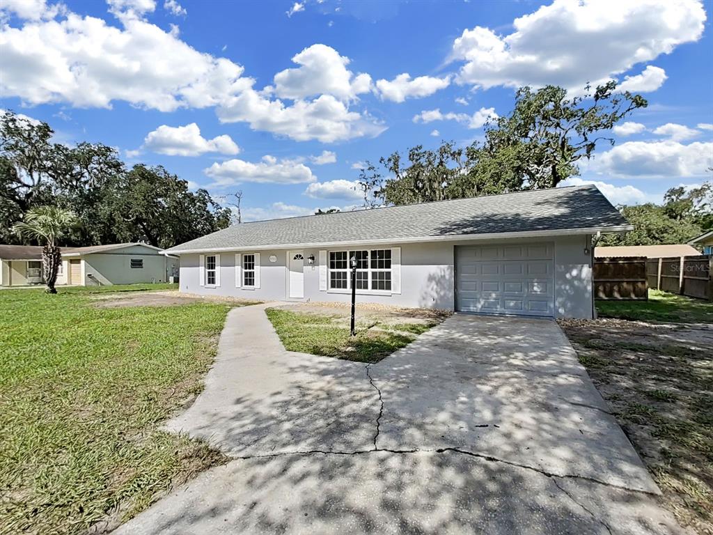 4943 MOCKINGBIRD DRIVE, DADE CITY, FL — photo 2 of 30