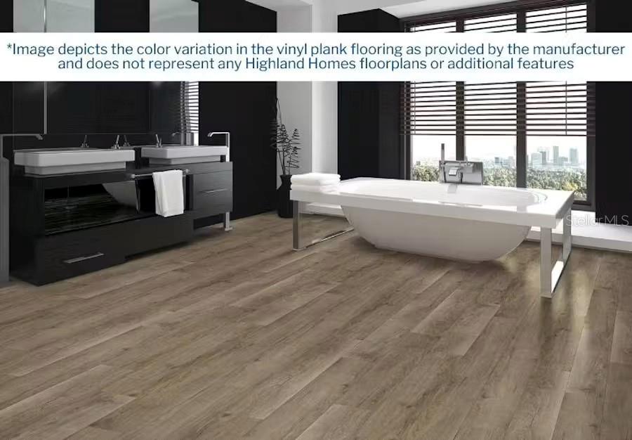 This rendering shows a modern bathroom with a freestanding tub, double vanity, and wood-look flooring — 617 CYPRESS CREEK RUN, ST CLOUD, FL