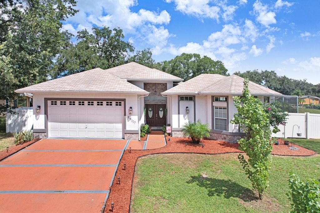 39117 9TH AVENUE, ZEPHYRHILLS, FL — photo 2 of 30