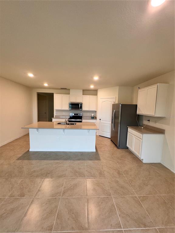913 AMBLESIDE DRIVE, HAINES CITY, FL — photo 4 of 32