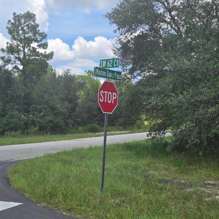 A stop sign stands at the intersection of SW 62 Ct and Marion Oaks Pass — TBD SW 62ND CT, OCALA, FL