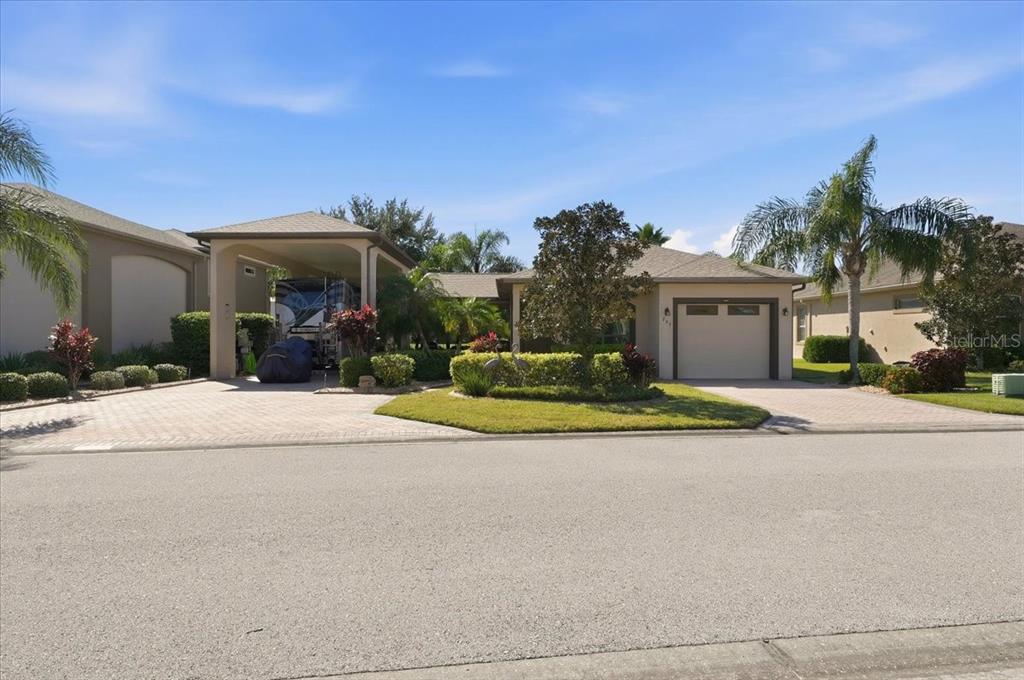 733 MEANDERING WAY, POLK CITY, FL — photo 2 of 30
