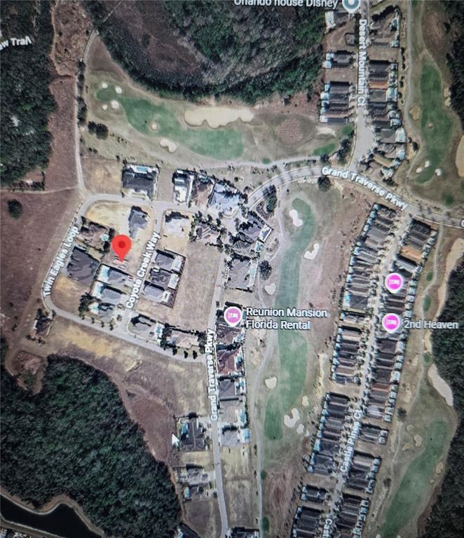 This is an aerial map showing residential homes, streets, and a golf course — 1006 COYOTE CREEK WAY, KISSIMMEE, FL