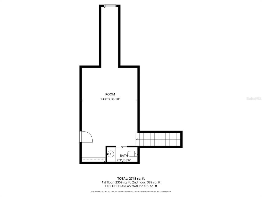 This is a floor plan showing a large rectangular room, a small bathroom, and a staircase — 119 GERBER DAIRY ROAD, EAGLE LAKE, FL