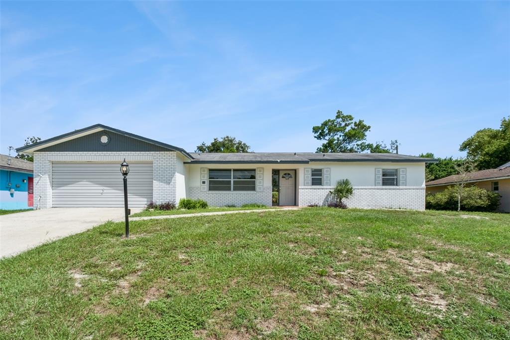 1679 E APACHE CIRCLE, DELTONA, FL — photo 2 of 30