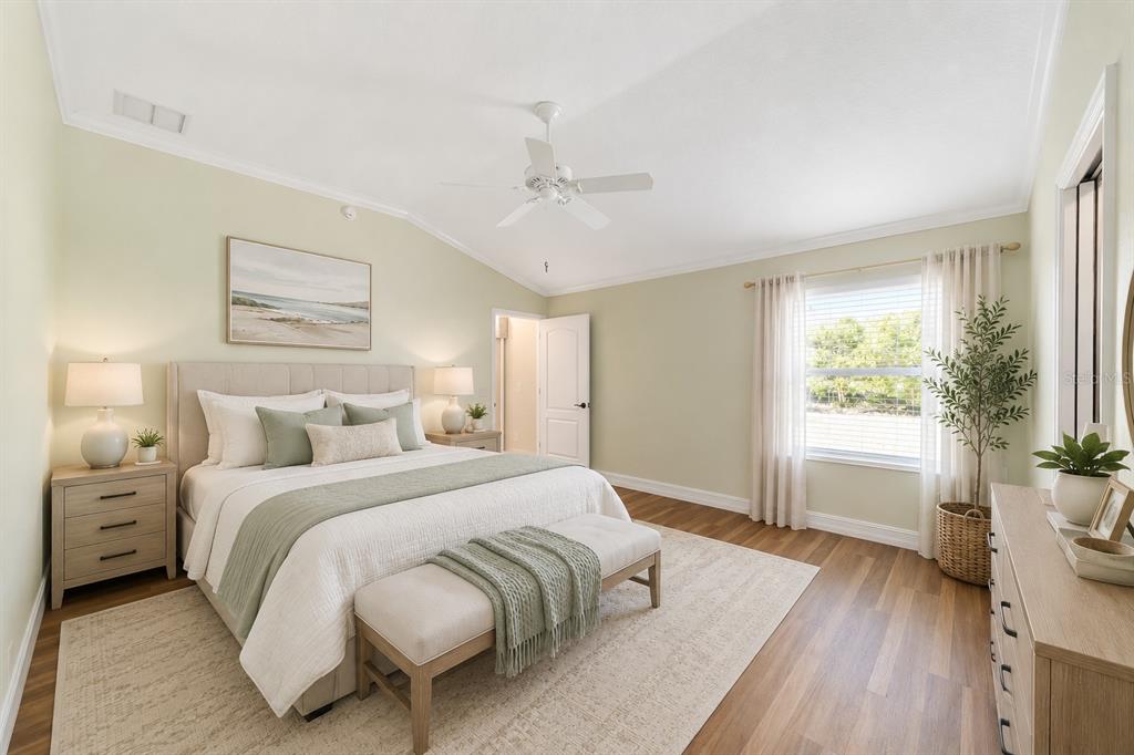 A single-story house with a beige garage and a decorative concrete driveway — 1109 ALCOVE LOOP, THE VILLAGES, FL