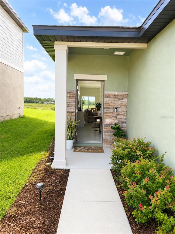 8728 SPORTSMAN LOOP, GROVELAND, FL — photo 2 of 24