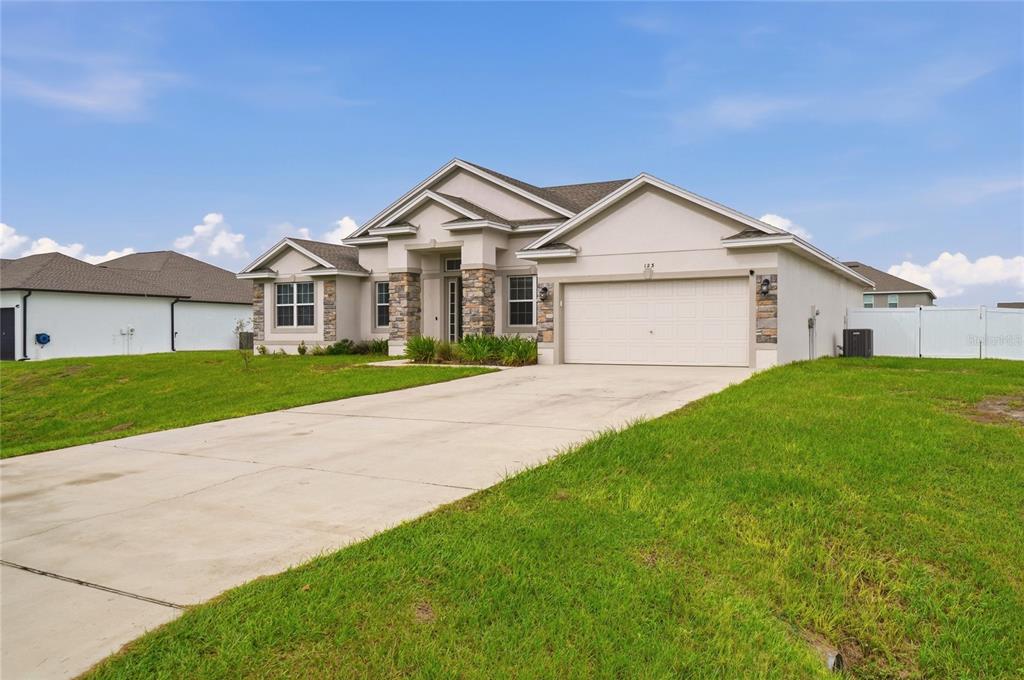 123 CALOOSA DRIVE, BABSON PARK, FL — photo 4 of 30