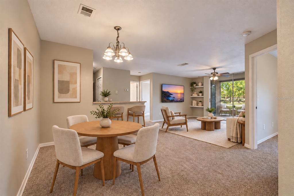 A white six-panel door stands at the end of a small tiled entryway — 8825 LATREC AVENUE UNIT 6103, ORLANDO, FL