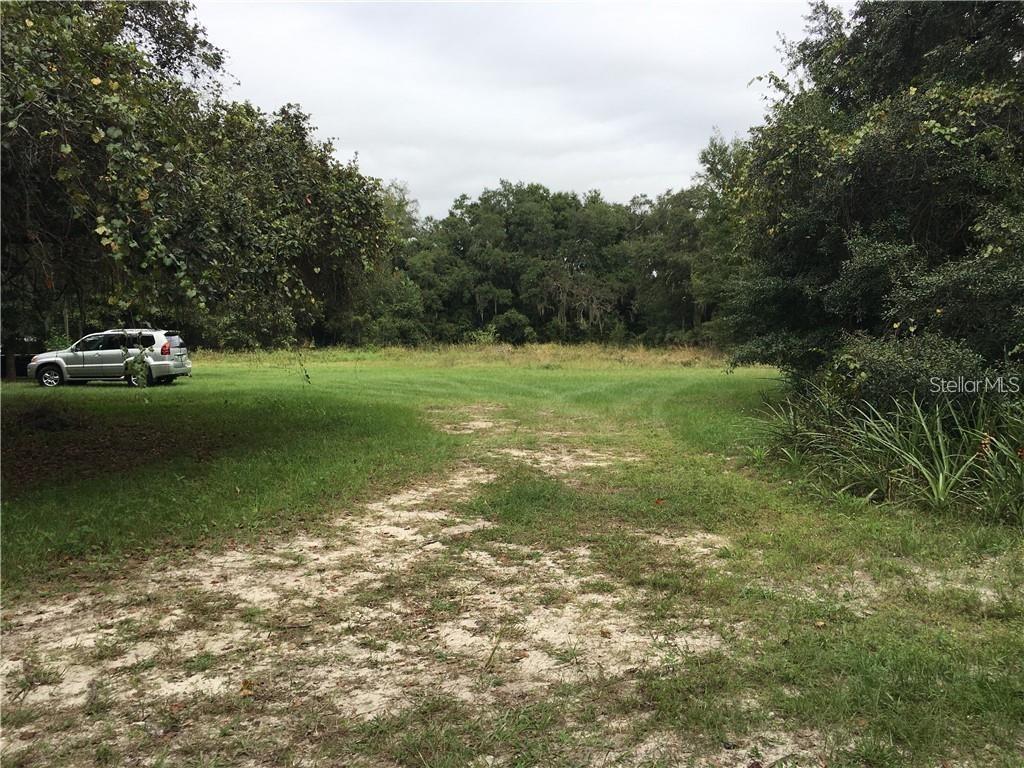 7839 UNIVERSITY GARDEN DRIVE, WINTER PARK, FL — photo 2 of 5