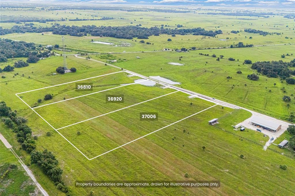 An aerial view shows three adjacent rectangular plots of grassy land marked with property boundaries — 37006 KVILLE ROAD, MYAKKA CITY, FL