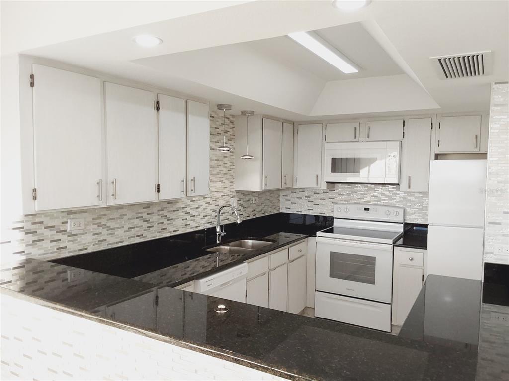 500 TREASURE ISLAND CAUSEWAY UNIT 502, TREASURE ISLAND, FL — photo 5 of 27