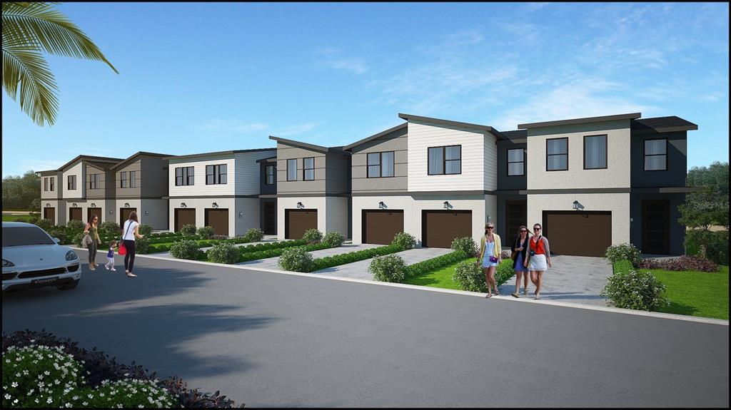 A digital rendering of a row of modern two-story townhomes with attached garages — 5177 HOFFNER AVENUE, ORLANDO, FL