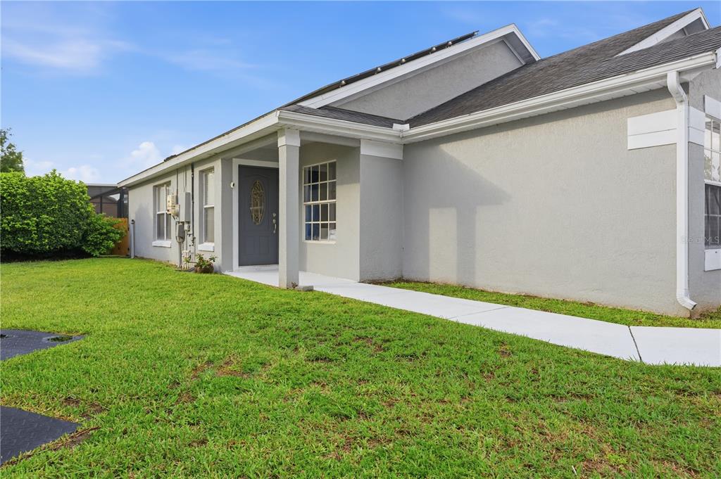 A screened-in patio features a swimming pool with an attached spa and concrete decking — 4702 FORT BRAVO COURT, ORLANDO, FL